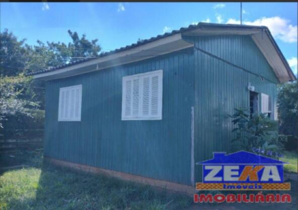 Casa em Madeira Estilo Chalé com Amplo Terreno